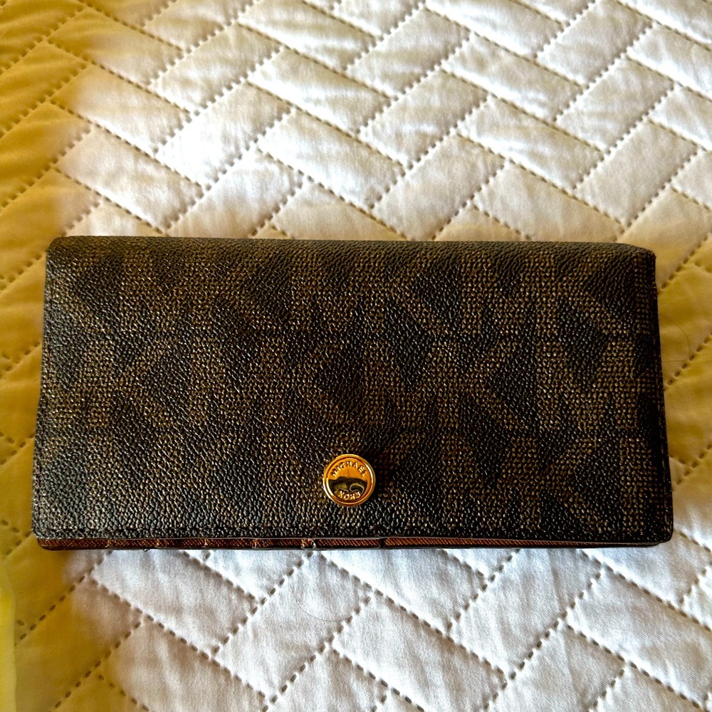 Michael Kors wallet lot of room for you cards.